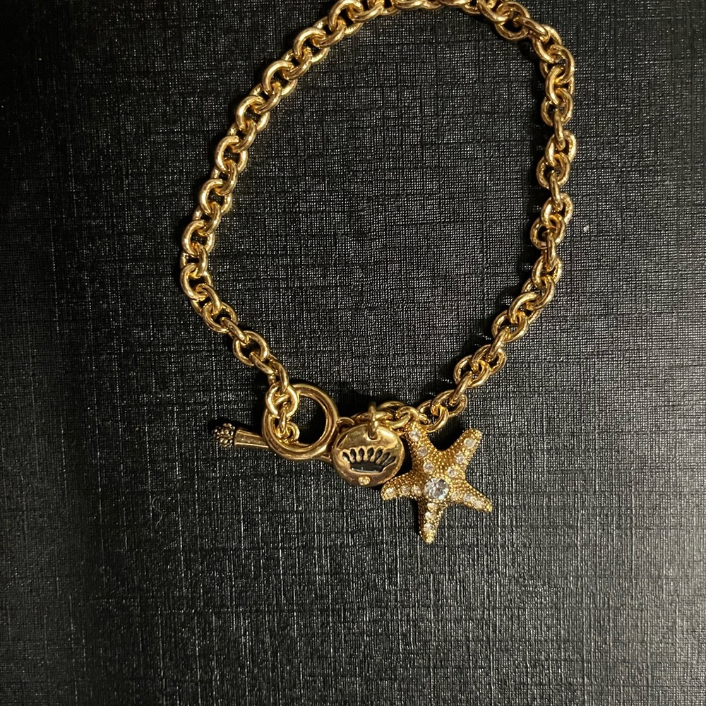 Juicy Couture Gold Charm Bracelet with Starfish and Crown